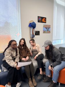 Group of researchers discussing ethics approval documents